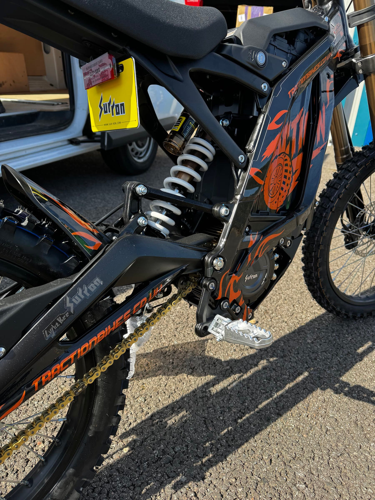 Rear suspension and swingarm detail on a Traction Bikes Sur-Ron Light Bee X