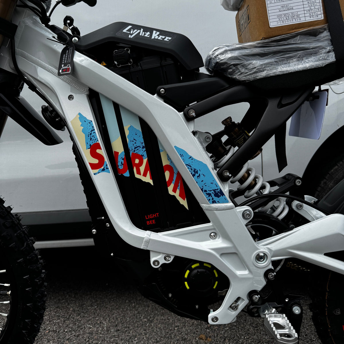 2026 Sur-Ron Light Bee X in White, close-up of the frame and SURRON graphics